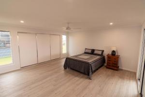 Katil atau katil-katil dalam bilik di Monaro House - Hervey Bay