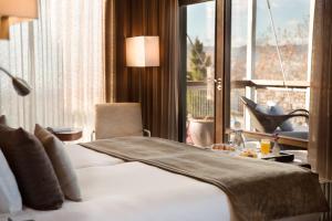 Llit o llits en una habitació de Hotel Miramar Barcelona GL