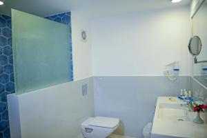 Ванная комната в Brayka Bay Reef Resort
