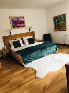 A bed or beds in a room at Rodope Nook Guest house