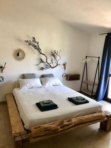 Postel nebo postele na pokoji v ubytování I Ginepri + 30 fotografií