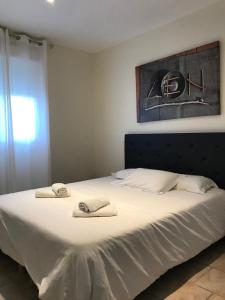 Кровать или кровати в номере Appartement PALAZZI 2