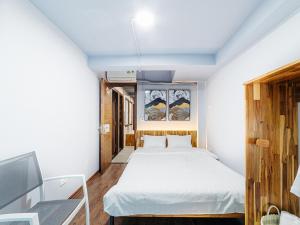 Letto o letti in una camera di Ha Noi Re Hostel