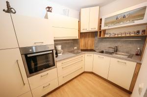 Kuchyň nebo kuchyňský kout v ubytování Appartement Else