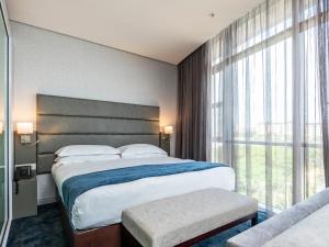 Postel nebo postele na pokoji v ubytování aha Gateway Hotel Umhlanga + 30 fotografií