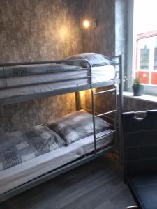 - deux lits superposés dans une chambre dans l'établissement Haus Malve Dahme, à Dahme