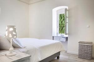 Postel nebo postele na pokoji v ubytování Villa Andromahi