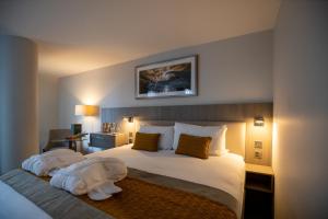 Cama ou camas em um quarto em Maldron Hotel Smithfield Dublin City