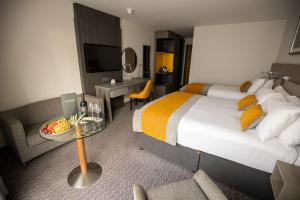 Cama ou camas em um quarto em Maldron Hotel Smithfield Dublin City