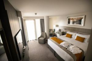 Cama ou camas em um quarto em Maldron Hotel Smithfield Dublin City