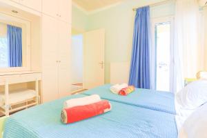 A bed or beds in a room at Villa Natasha