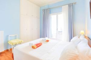 A bed or beds in a room at Villa Natasha