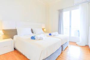 A bed or beds in a room at Villa Natasha