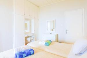 A bed or beds in a room at Villa Natasha