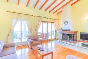 A television and/or entertainment centre at Villa Natasha