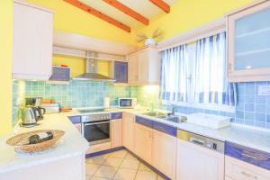 A kitchen or kitchenette at Villa Natasha
