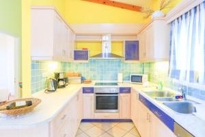 A kitchen or kitchenette at Villa Natasha