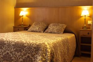 Postel nebo postele na pokoji v ubytování Hostal Orejas