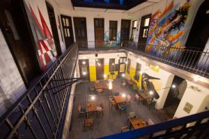 an overhead view of a building with tables and chairs at Hostel Cornel in Timişoara
