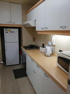 A cozinha ou cozinha compacta de Temporary Rent Viña del Mar