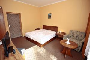 Voodi või voodid majutusasutuse Hotel SOREA ĎUMBIER toas