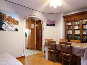 a dining room with a table and chairs at Chalet Roche Rousse in Gresse-en-Vercors