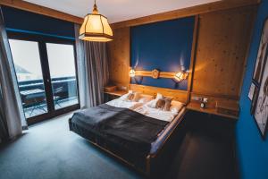 Postel nebo postele na pokoji v ubytování Hotel Sportalm - Adults Only Boutique Hotel