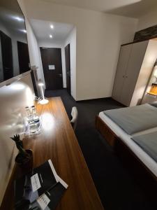 Postel nebo postele na pokoji v ubytování Hotel Starton am Ingolstadt Village