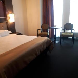 Letto o letti in una camera di Hotel Medemblik