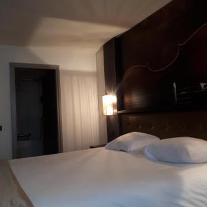 Letto o letti in una camera di Hotel Medemblik