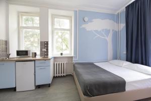 Voodi või voodid majutusasutuse Norke Varshavskaya toas