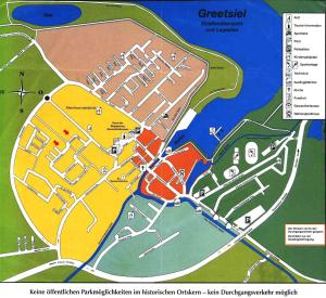 a map of a city with buildings and roads at Haus Schimmelreiter in Greetsiel +50 photos