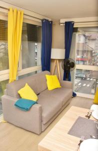 Posezení v ubytování APPARTEMENT ENTRE GENÈVE ET CHAMONIX AU PIED DES MONTAGNES