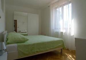 Posteľ alebo postele v izbe v ubytovaní Apartments Smolica