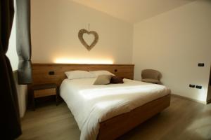 Cama o camas de una habitación en Appartamento Gavazza