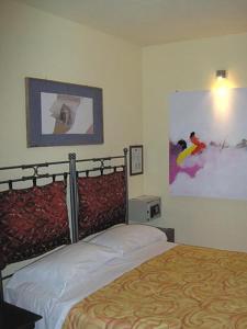 Postel nebo postele na pokoji v ubytování Agriturismo Zaffamaro