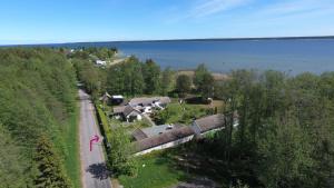 an aerial view of a house next to the water at Käsmu Merekalda Apartments - Adults only in Käsmu