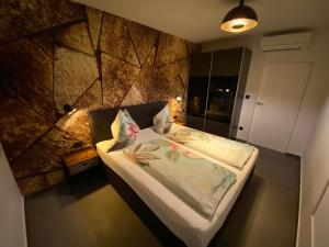 Villa Lio I tesisinde bir odada yatak veya yataklar