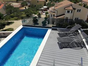 Bazén v ubytovaní Villa Lio I alebo v jeho blízkosti