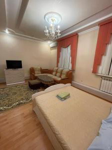 
Кровать или кровати в номере Сити
