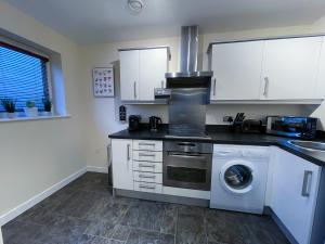 Dapur atau dapur kecil di Station Side Penthouse +32 gambar