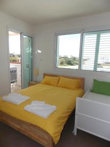 Ένα ή περισσότερα κρεβάτια σε δωμάτιο στο Avra Garden Villa