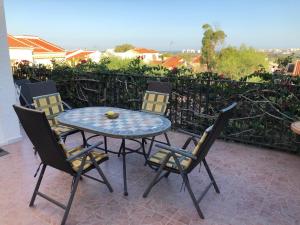 a table and chairs sitting on a patio at Sonniges Apartment an der Costa Blanca in San Fulgencio