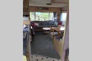 Posezení v ubytování Knusse caravan camping Duinoord 300m van strand