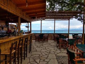 a bar with a view of the ocean at Tilegrafos Studios in Lefkada