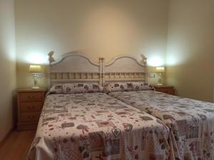 Postel nebo postele na pokoji v ubytování Raitán, apartamento centro de Llanes a 400 m de la playa VUT-2345-AS