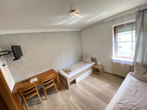 Postel nebo postele na pokoji v ubytování Pension Günther + 11 fotografií
