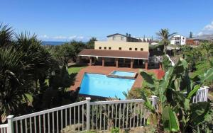 an aerial view of a house with a swimming pool at 219 Laguna la Crete in Margate