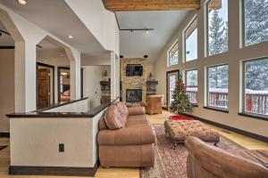 a large living room with a pool table at Pristine Breckenridge Home with Hot Tub and Mtn Views! in Breckenridge