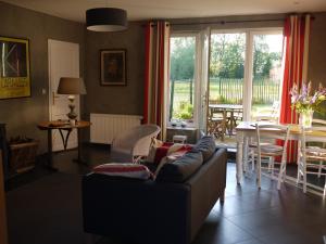 Posezení v ubytování Gîte de la Ferme Rose